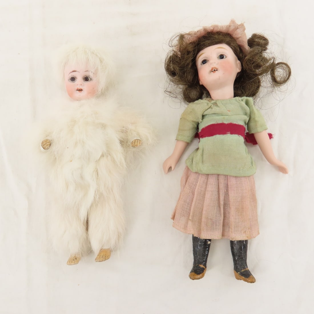 Gebrüder Kühnlenz & Snow Baby Porcelain Doll: Gebrüder Kühnlenz & Snow Baby Porcelain Doll - German 8.5" doll with porcelain head marked GK (Gebrüder Kühnlenz) in Sunburst marked with 44-18 Bavaria. cork body, porcelain head w