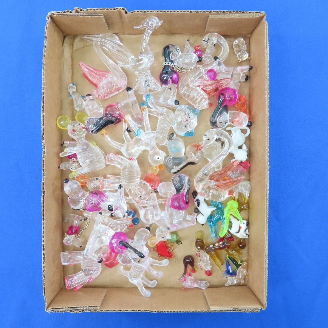 Vintage Lucite and Glass Animals & Snoopy Dogs: Vintage Lucite and Glass Animals & Snoopy Dogs - Please ask questions & read terms & conditions before bidding. Live Auctioneers only display 20 photos per lot, whereas Proxibid and our A New Day bidd