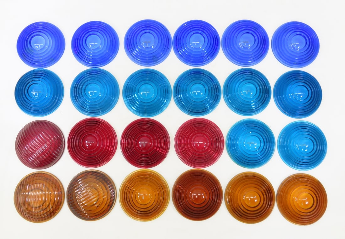 24 Signal Glass Lenses with outside ridges: 24 Signal Glass Lenses with outside ridges - 5 3/8": 4 red, 6 amber, 8 green, 6 blue Live Auctioneers only shows 20 photos- all photos are viewableon Proxibid. https://www.proxibid.com/A-New-Day-Aucti