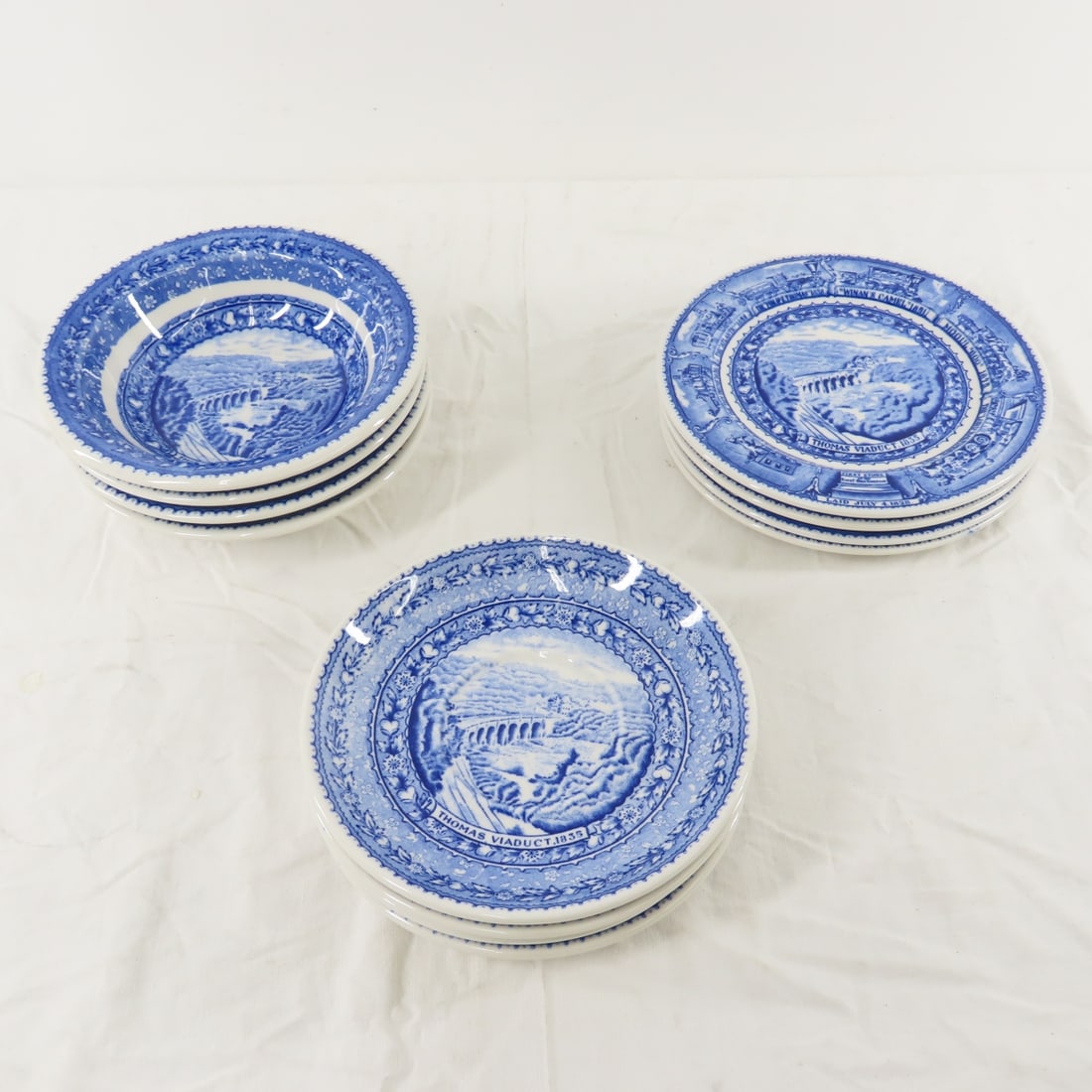 4 B&O Centenary Bowls, 4 Saucers & 4 Plates: 4 B&O Centenary Bowls, 4 Saucers & 4 Plates - "Design patented" BS Scammell- Lamberton, Thomas Viaduct, 4 6 3/8" bowls, 4 6 7/8" plates, and 4 6 1/4" saucers, all have very minor utensil use Live Auct