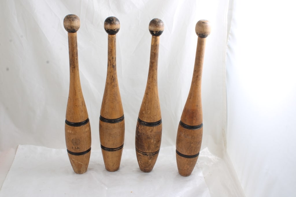 4 Antique Wooden Indian Juggling Clubs 1 Lb. Each: 4 Antique Wooden Indian Juggling Clubs 1 Lb. Each - As pictured. Please read terms and conditions and askquestions before bidding. Live Auctioneers only shows 20 photos per lot. All photos can be view