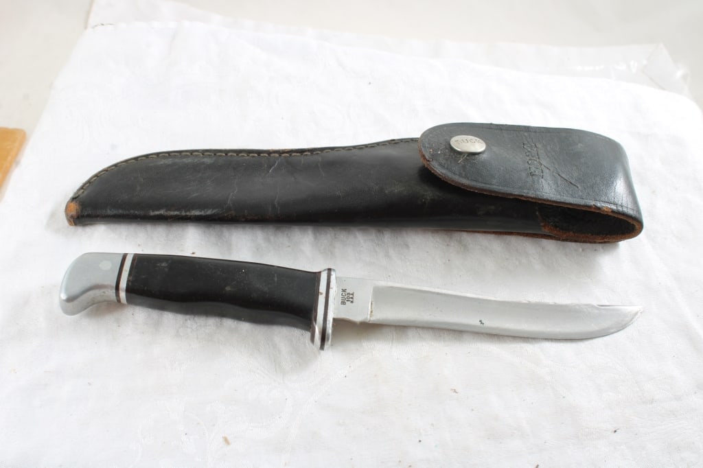 Buck #105 Fixed Blade Knife with Leather Sheath: Buck #105 Fixed Blade Knife with Leather Sheath - As pictured. Please read terms and conditions and askquestions before bidding. Live Auctioneers only shows 20 photos per lot. All photos can be viewed