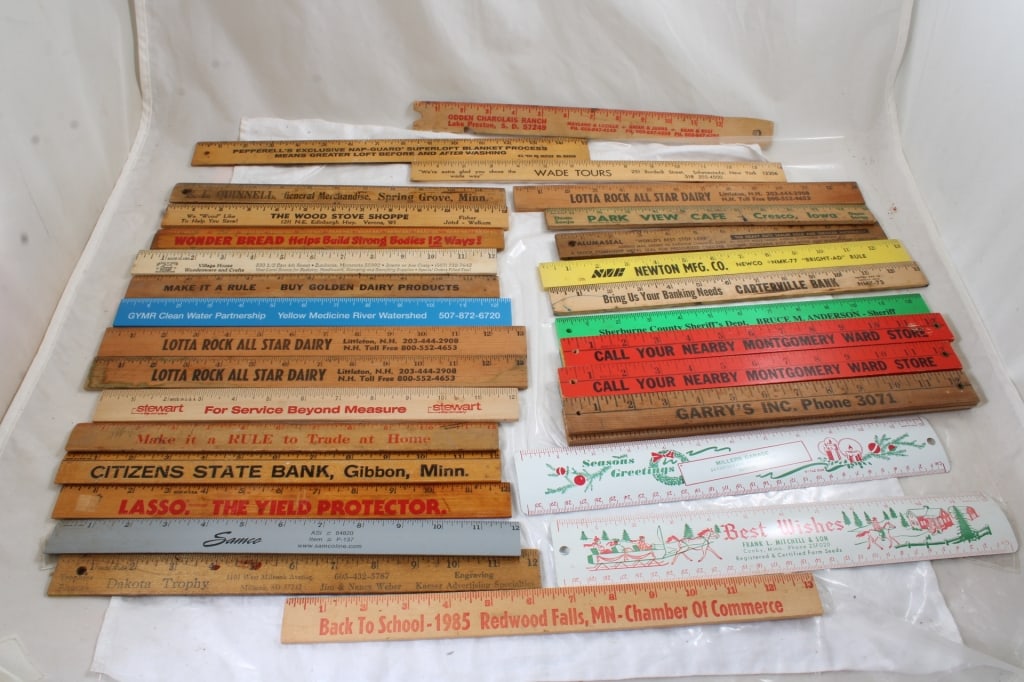 30 Wood & Metal Advertising Rulers: 30 Wood & Metal Advertising Rulers - As pictured. Please read terms and conditions and askquestions before bidding. Live Auctioneers only shows 20 photos per lot. All photos can be viewed on Proxibid 