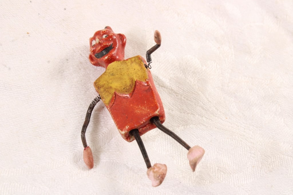 Red Devil Composition Ornament Pin Japan: Red Devil Composition Ornament Pin Japan - with Spring Arms & Legs. Measures 2 1/4" Tall and marked JAPAN on the backside. As pictured. Please read terms and conditions and askquestions before bidding
