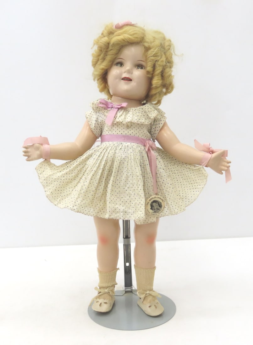 1934-35 Ideal 18" Shirley Temple Compo Doll: 1934-35 Ideal 18" Shirley Temple Compo Doll - back of head marked "18 / SHIRLEY TEMPLE / IDEAL / COP T&N CO", back is marked "SHIRLEY TEMPLE 18". Face is faded, almost no crazing throughout, open mout