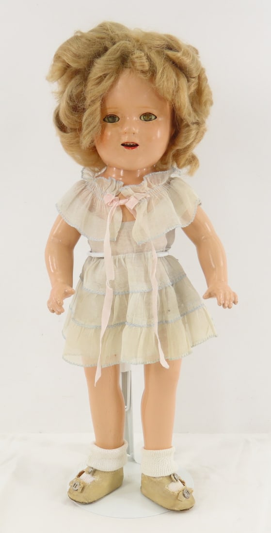 1934-35 Ideal 16" Shirley Temple Compo Doll: 1934-35 Ideal 16" Shirley Temple Compo Doll - back of head marked "16 / SHIRLEY TEMPLE / IDEAL / COP T&N CO", back is marked "SHIRLEY TEMPLE 16". some minor crazing and cracking, face looks to have so