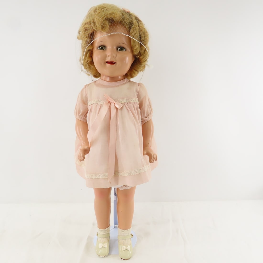 Early Ideal Shirley Temple 18" Compo Doll: Early Ideal Shirley Temple 18" Compo Doll - All compo doll, back of head marked "18 IDEAL DOLL MADE IN USA", cracks in compo, sleep eyes with lashes, open mouth with teeth, wig with ribbon, vintage dr