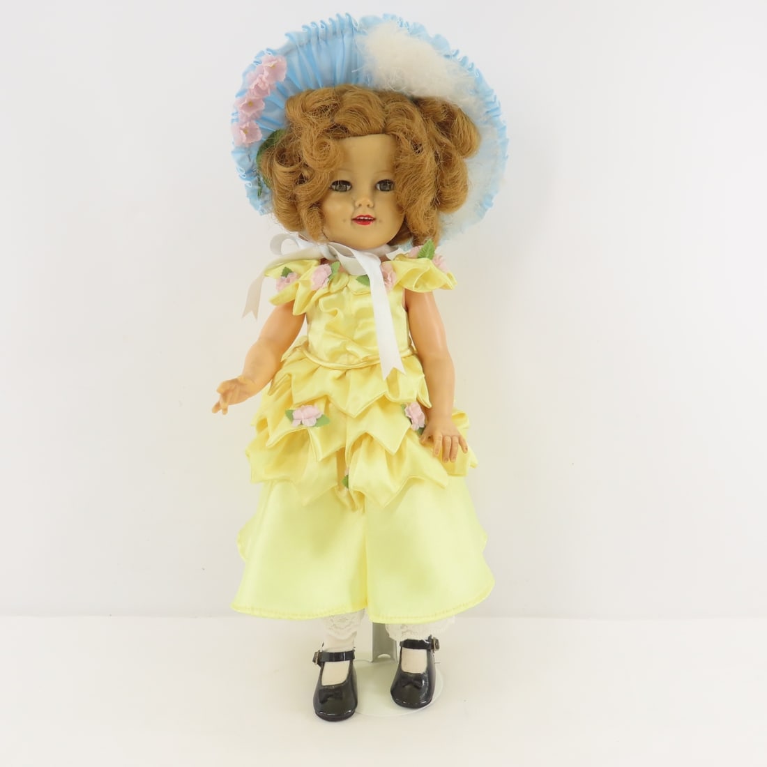 1959-60 Ideal 17" Vinyl Shirley Temple Doll: 1959-60 Ideal 17" Vinyl Shirley Temple Doll - head & back marked "IDEAL DOLL ST-17-1" in custom Little Colonel style yellow dress, vinyl, sleepy eyes with lashes, open mouth with teeth, dimples, with