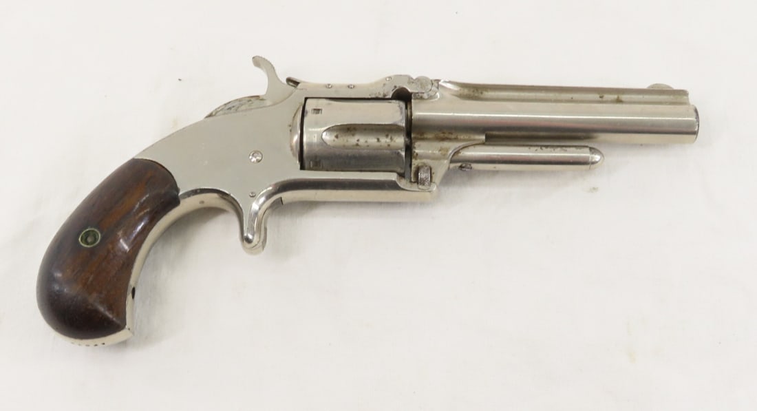 Smith & Wesson Mod 1 1/2 2nd Issue Revolver .32 RF: Smith & Wesson Mod 1 1/2 2nd Issue Revolver .32 RF - ANTIQUE SN# 41347,.32 S&W long rimfire, tip up, 5 shot fluted cylinder, 3.5" round ribbed barrel- top strap marked "SMITH & WESSON SPRINGFIELD. MAS