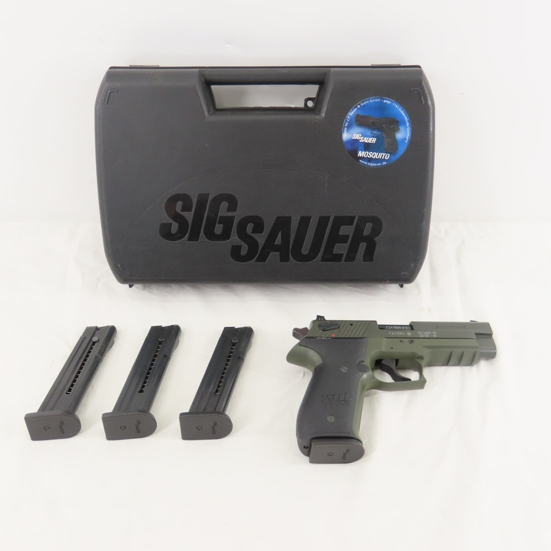 Sig Sauer Mosquito OD Green .22 LR Pistol: Sig Sauer Mosquito OD Green .22 LR Pistol - SN# F241584, made in Germany, import by Sig Sauer Exeter NH, 4" barrel, fixed 3 dot sights, textured Sig Sauer grips, with 4 10 round magazines and hard cas