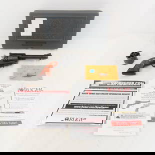 Ruger New Model Blackhawk .45 Auto Pistol: Ruger New Model Blackhawk .45 Auto Pistol - SN# 48-62263, with extra 6 round cylinder, 5 1/2" barrel, iron sights, wood grips with medallion, paperwork, test brass and case. Mfg 2013. FFL transfer