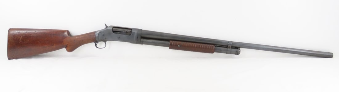 Winchester Model 1897 Pump Action 12GA Shotgun: Winchester Model 1897 Pump Action 12GA Shotgun - SN C121865, 29" full choke barrel with front bead sight- top marked "MANUFACTURED BY THE WINCHESTER REPEATING ARMS CO / NEW HAVEN CONN USA PAY NOV 25.9