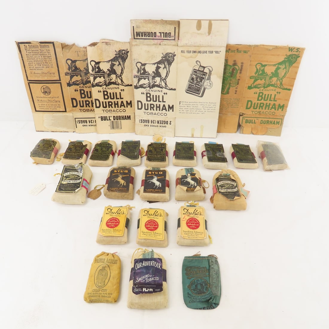 Full Vintage Tobacco Pouches Bull Durham & more: Full Vintage Tobacco Pouches Bull Durham & more - Bull Durham cardboard containers Photos are part of description. Please ask questions and read terms & conditions before bidding.