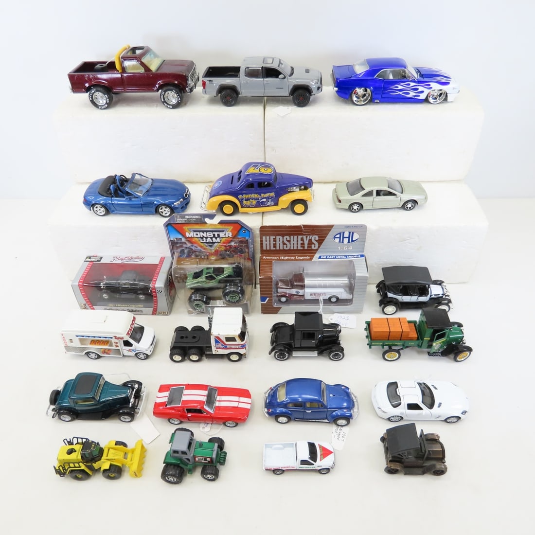 22 Assorted Size Diecast Vehicles & Antique Cars: 22 Assorted Size Diecast Vehicles & Antique Cars - Tonka, Nylint, Buddy-L , Kinsmart, a few in boxes, a few are banks Photos are part of description. Please ask questions and read terms & conditions b