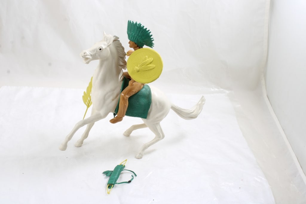 Marx Flying Eagle Indian & White Cloud Horse: Marx Flying Eagle Indian & White Cloud Horse - Weighs 7.7 Oz. and measures 12" long horse x 9" tall to top of Flying Eagle Indian on the horse.. Photos are part of description- Live Auctioneers only s