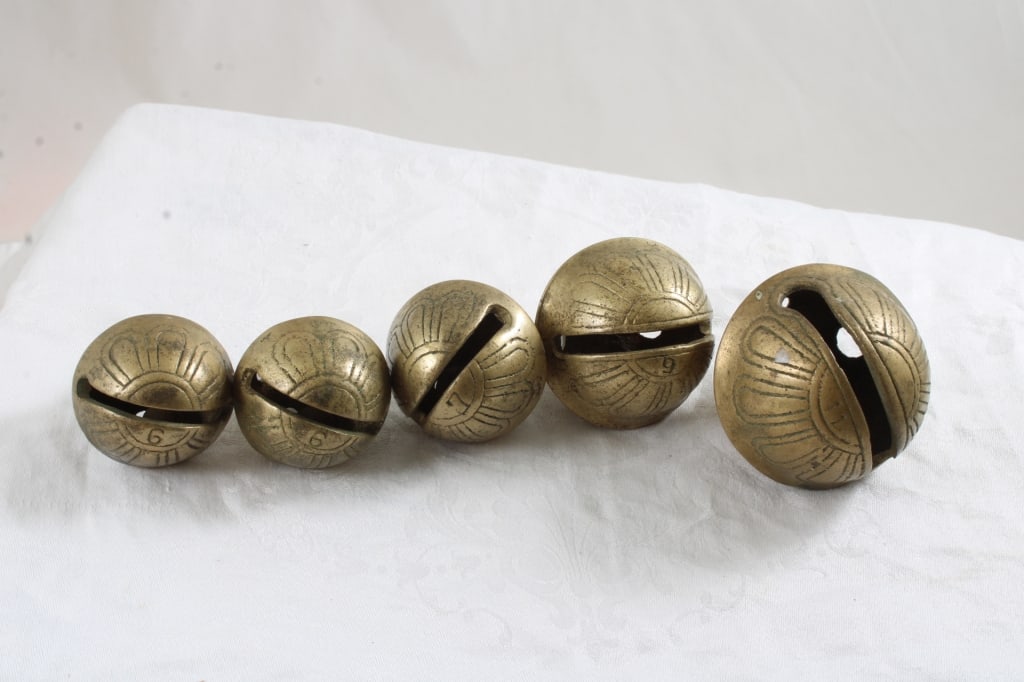 Antique Lot of 5 Brass Sleigh Bells: Antique Lot of 5 Brass Sleigh Bells - There are 2 #6 Bells, 1 #7 Bell, 1 #9 Bell and 1 #11 Bell.. Photos are part of description- Live Auctioneers only shows 20 photos per lot, if there are more you c