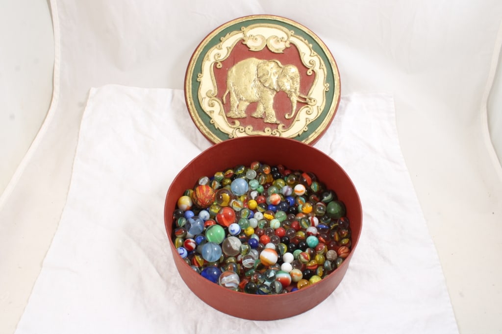 Round Container Full of Vintage Marbles w Elephant: Round Container Full of Vintage Marbles w Elephant - on the top. Photos are part of description- Live Auctioneers only shows 20 photos per lot, if there are more you can view them on Proxibid or biddi