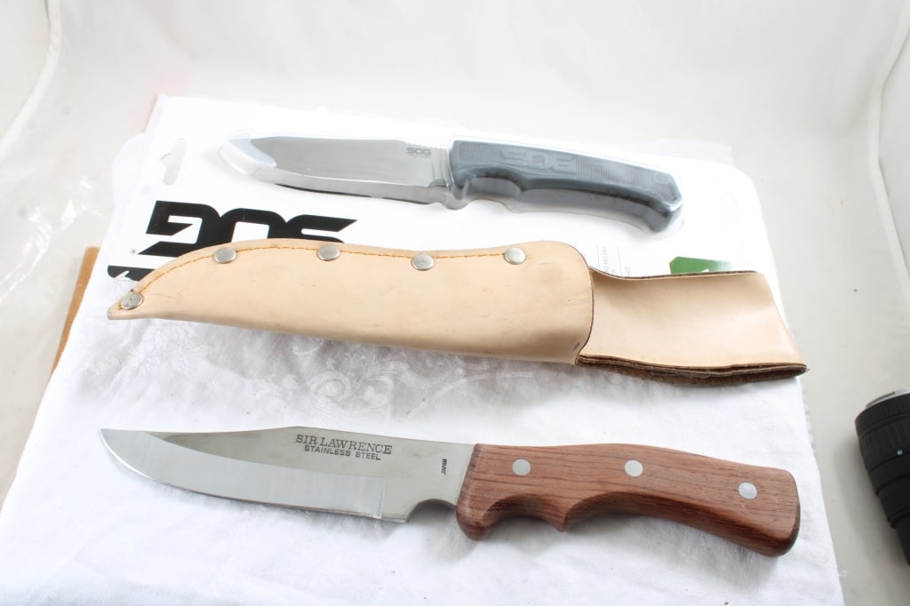 2 Fixed Blade Knives SOG NIP, Sir Lawrence Sheath: 2 Fixed Blade Knives SOG NIP, Sir Lawrence Sheath - . Photos are part of description- Live Auctioneers only shows 20 photos per lot, if there are more you can view them on Proxibid or bidding app. Ple