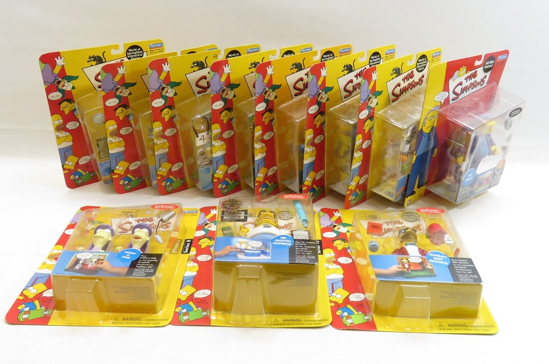 The Simpsons Playmates Interactive Action Figures: The Simpsons Playmates Interactive Action Figures - 11 figures. New in package. Please ask questions and read terms & conditions before bidding. Photos are part of description- Live Auctioneers only s