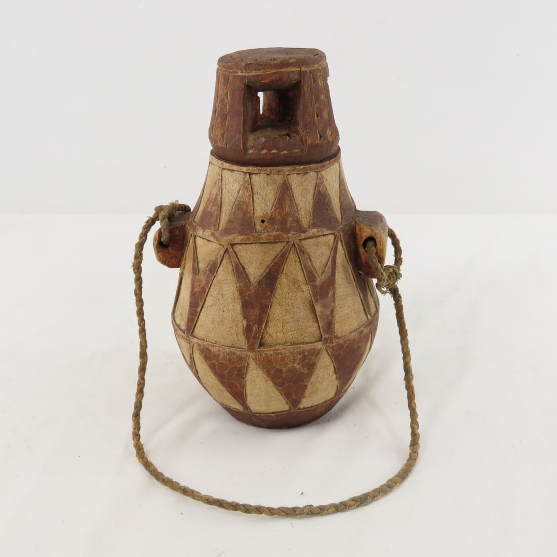 Ethiopian Samburu, Lmala Milk Container: Ethiopian Samburu, Lmala Milk Container - 7.5" tall, Hand Carved wood, Lot size: 8 x 5 x 5", 2 lbs Photos are part of lot description. Please ask questions and read terms & conditions before bidding.