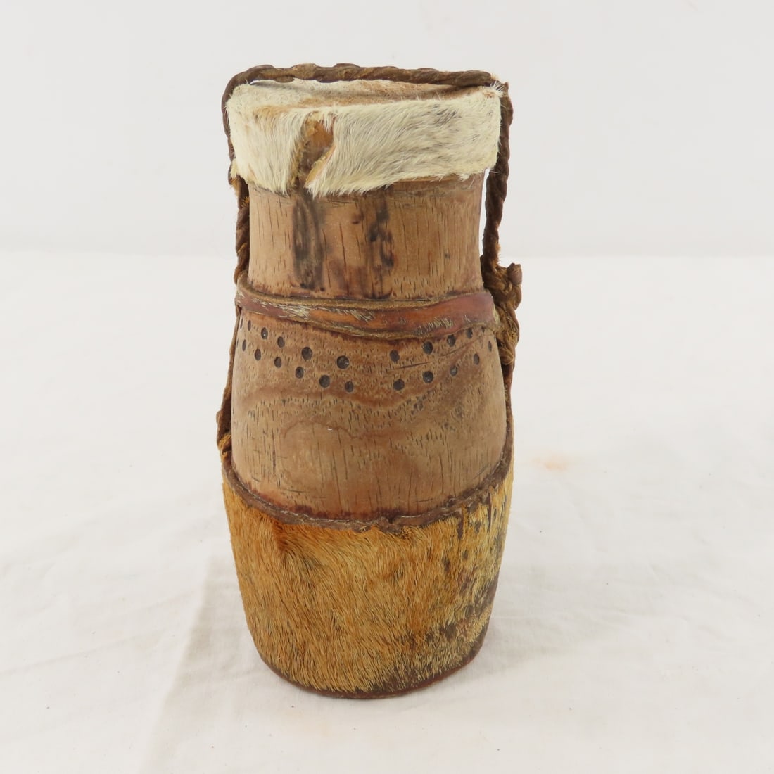Kenyan, African Turkana Eburi Milk/Fat Gourd Jug: Kenyan, African Turkana Eburi Milk/Fat Gourd Jug - 6" tall, Animal hide stretched over Gourd, Lot size: 7 x 4 x 4", 1 lb Photos are part of lot description. Please ask questions and read terms & condi