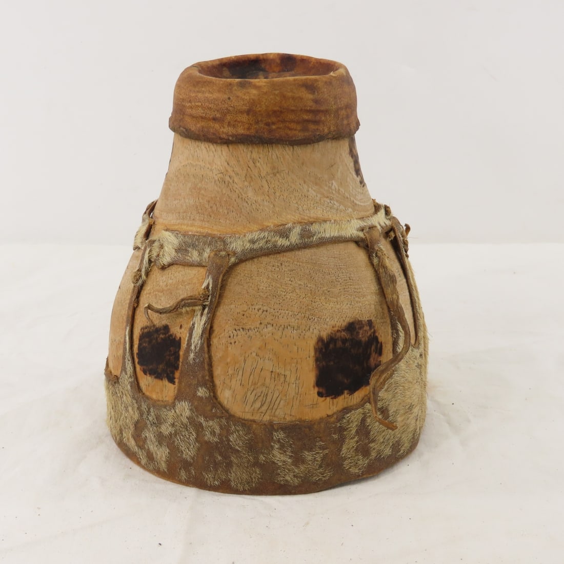 Kenyan, African Turkana Eburi Milk/Fat Gourd Jug: Kenyan, African Turkana Eburi Milk/Fat Gourd Jug - 7" tall, Animal hide stretched over Gourd, Lot size: 7 x 6 x 6", 2 lbs Photos are part of lot description. Please ask questions and read terms & cond