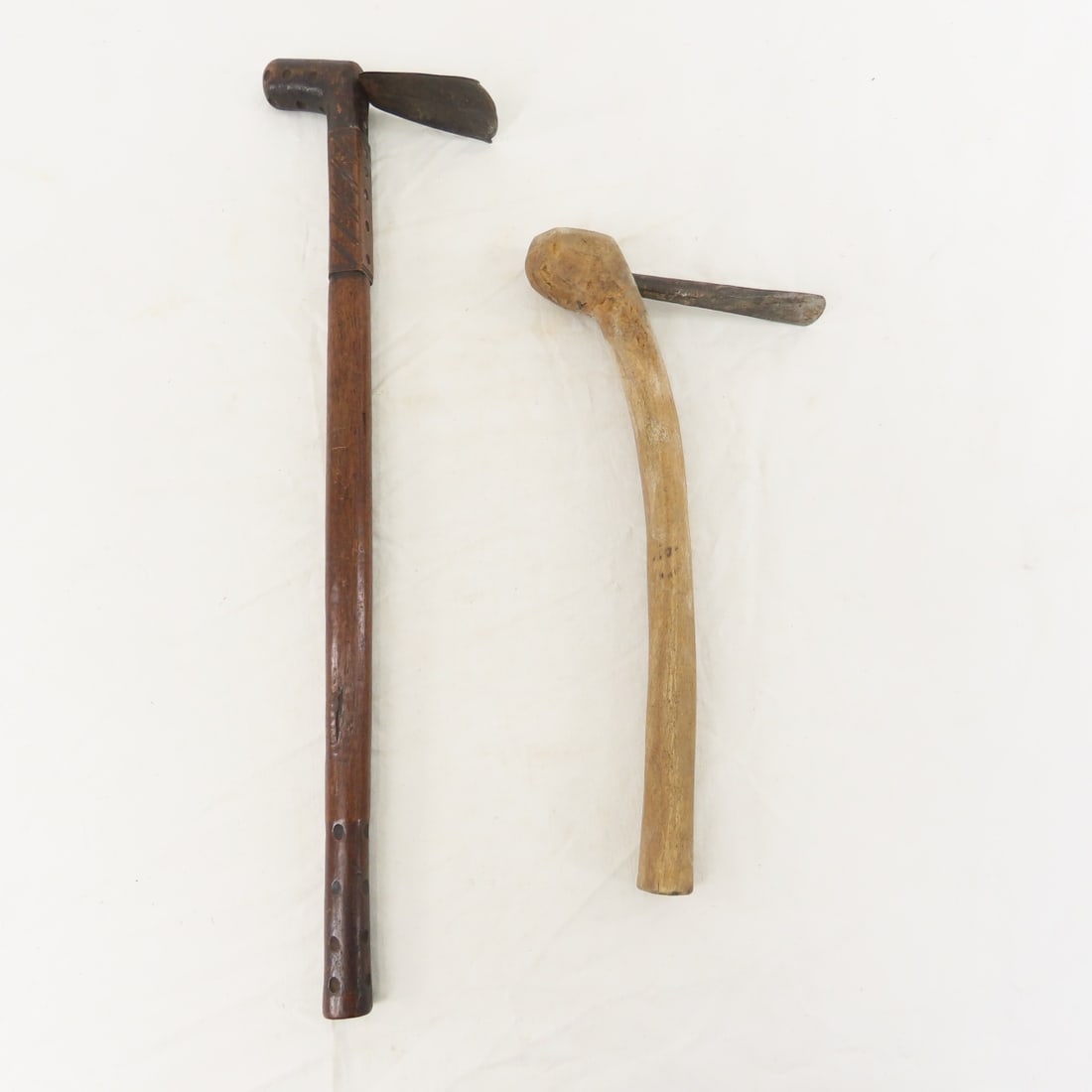 2 African Adze Wood Shaping Tools: 2 African Adze Wood Shaping Tools - 18.5 & 12", Lot size: 20 x 7 x 5", 2 lb Photos are part of lot description. Please ask questions and read terms & conditions before bidding.