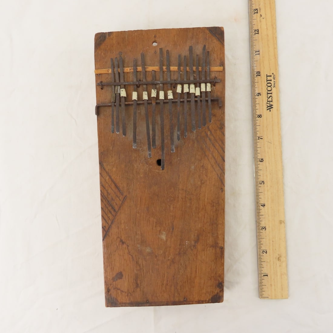 African14 Key Kalimba, Sanza Mbira or Thumb Piano: African14 Key Kalimba, Sanza Mbira or Thumb Piano - 11.5", Lot size: 12 x 6 x 2", 2 lbs Photos are part of lot description. Please ask questions and read terms & conditions before bidding.