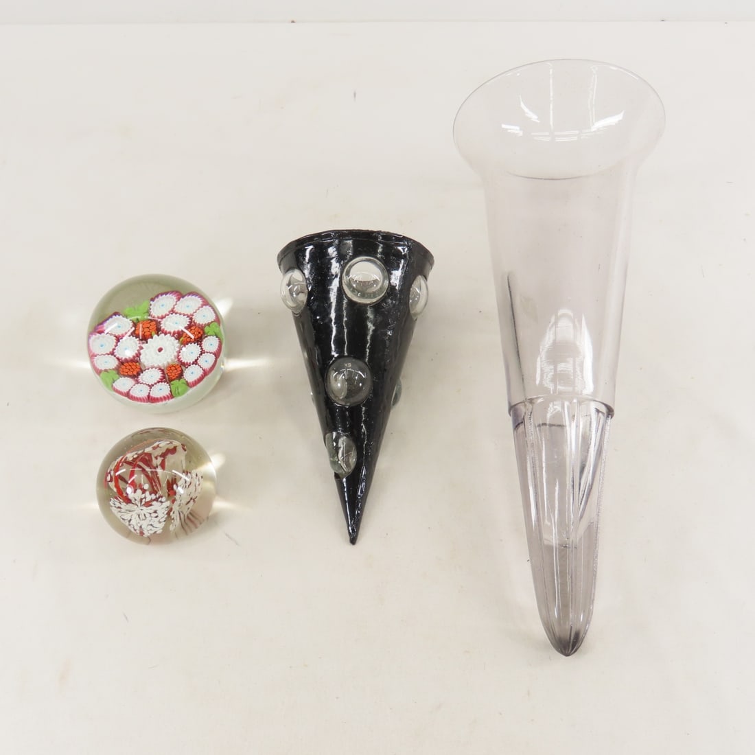 2 Glass Paperweights & 2 Vase Inserts: 2 Glass Paperweights & 2 Vase Inserts - Largest insert is 12". Lot size: 13 x 12 x 7", 6 lbs Photos are part of lot description. Please ask questions and read terms & conditions before bidding.