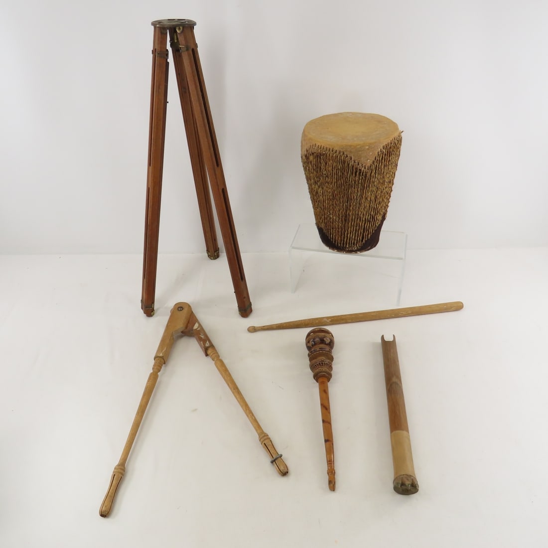 Vintage Animal Hide Drum, Wood Tripod & more: Vintage Animal Hide Drum, Wood Tripod & more - Longest piece 21". Lot size: 21 x 12 x 8", 5 lbs Photos are part of lot description. Please ask questions and read terms & conditions before bidding.