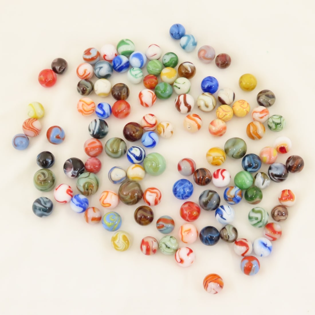 West Virginia Swirl Marbles: West Virginia Swirl Marbles - Lot Size 5x5x5" 2lbPhotos are part of description. Please ask questions and read terms & conditions before bidding.