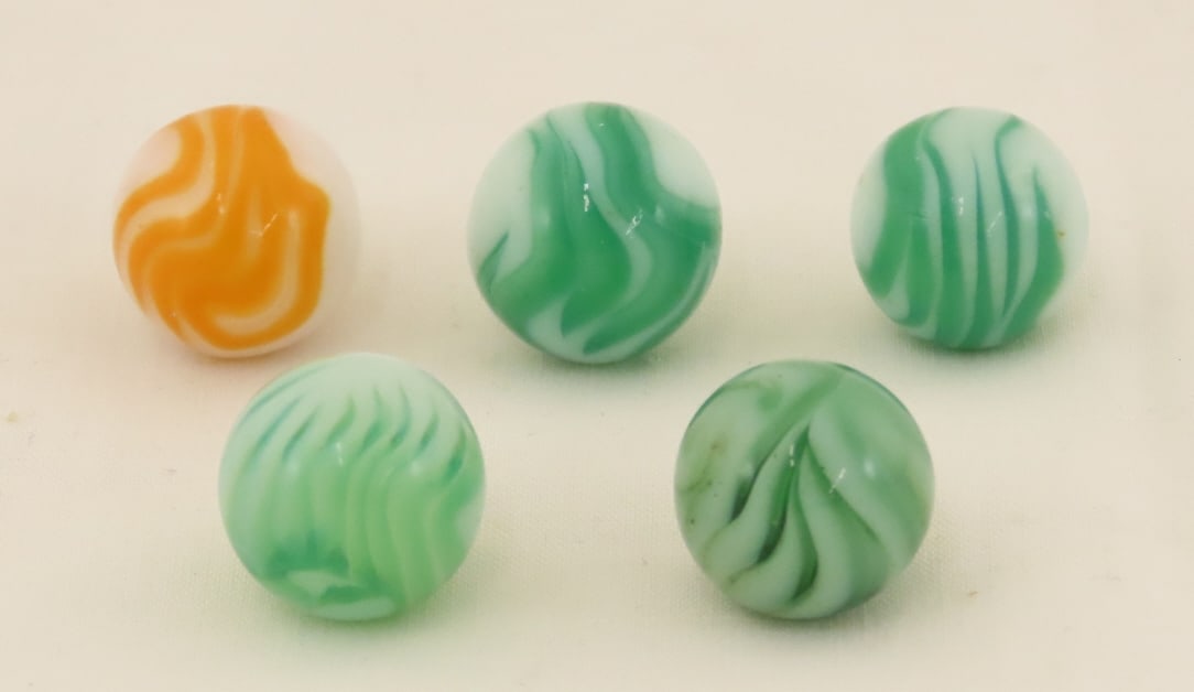 5 West Virginia Flame Marbles: 5 West Virginia Flame Marbles - Lot Size 3x3x3" 1lbPhotos are part of description. Please ask questions and read terms & conditions before bidding.