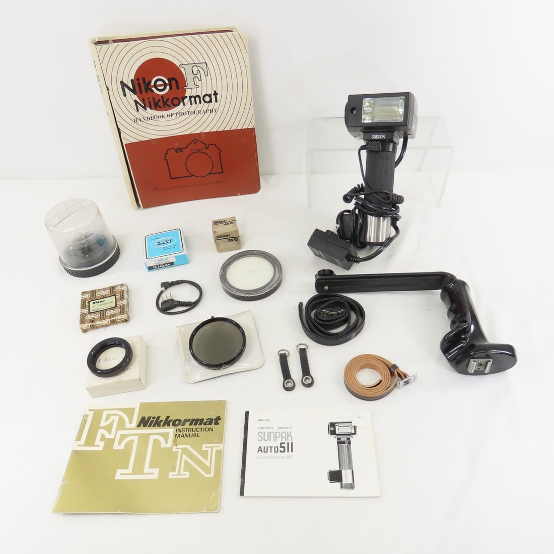 Early Nikon 35mm Film Camera Literature: Early Nikon 35mm Film Camera Literature - and other Accessories. Lot size: 15 x 10 x 7", 9 lbsPhotos are part of description. Please ask questions and read terms & conditions before bidding.