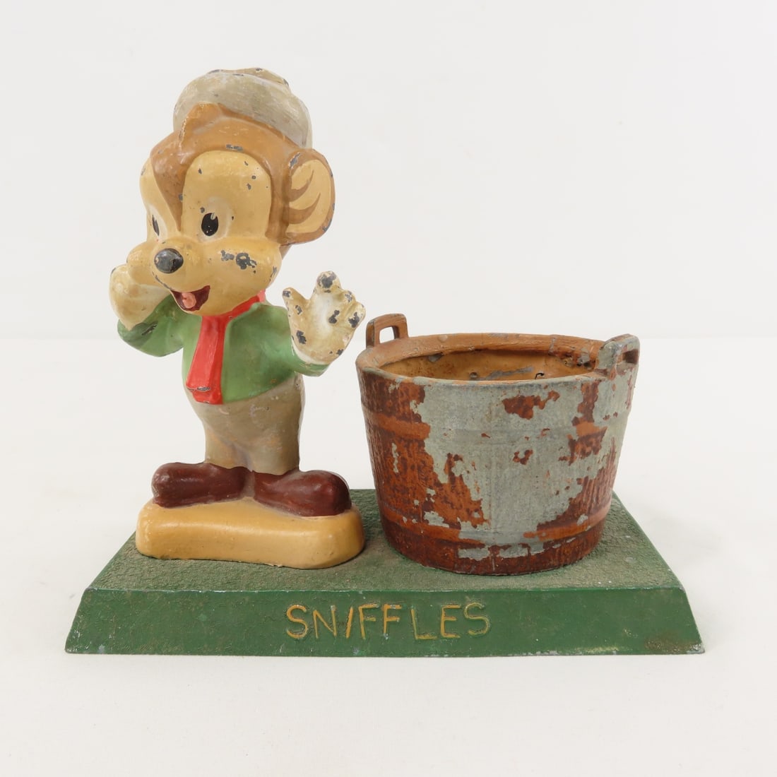 Cast Iron Looney Tunes Sniffles Pencil Holder: Cast Iron Looney Tunes Sniffles Pencil Holder - ca. 1940's, Lot size: 6 x 6 x 3", 1.5 lbsPhotos are part of description. Please ask questions and read terms & conditions before bidding.