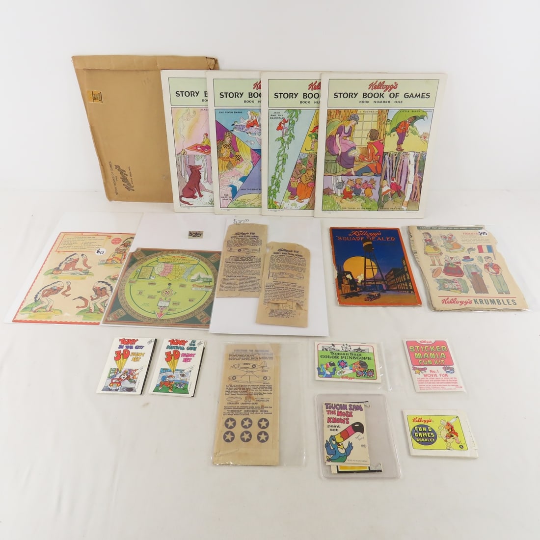 Kellogg's Premiums and Advertising: Kellogg's Premiums and Advertising - all 4 Story Book of games- unpunched, Oct 1913 Square Dealer, Wheel of Knowledge, Kut-Outs No. 2 Wa-Ka-Kog Braves, 5 Krumbles cut-out dolls, 5 PEP planes, 6 cereal