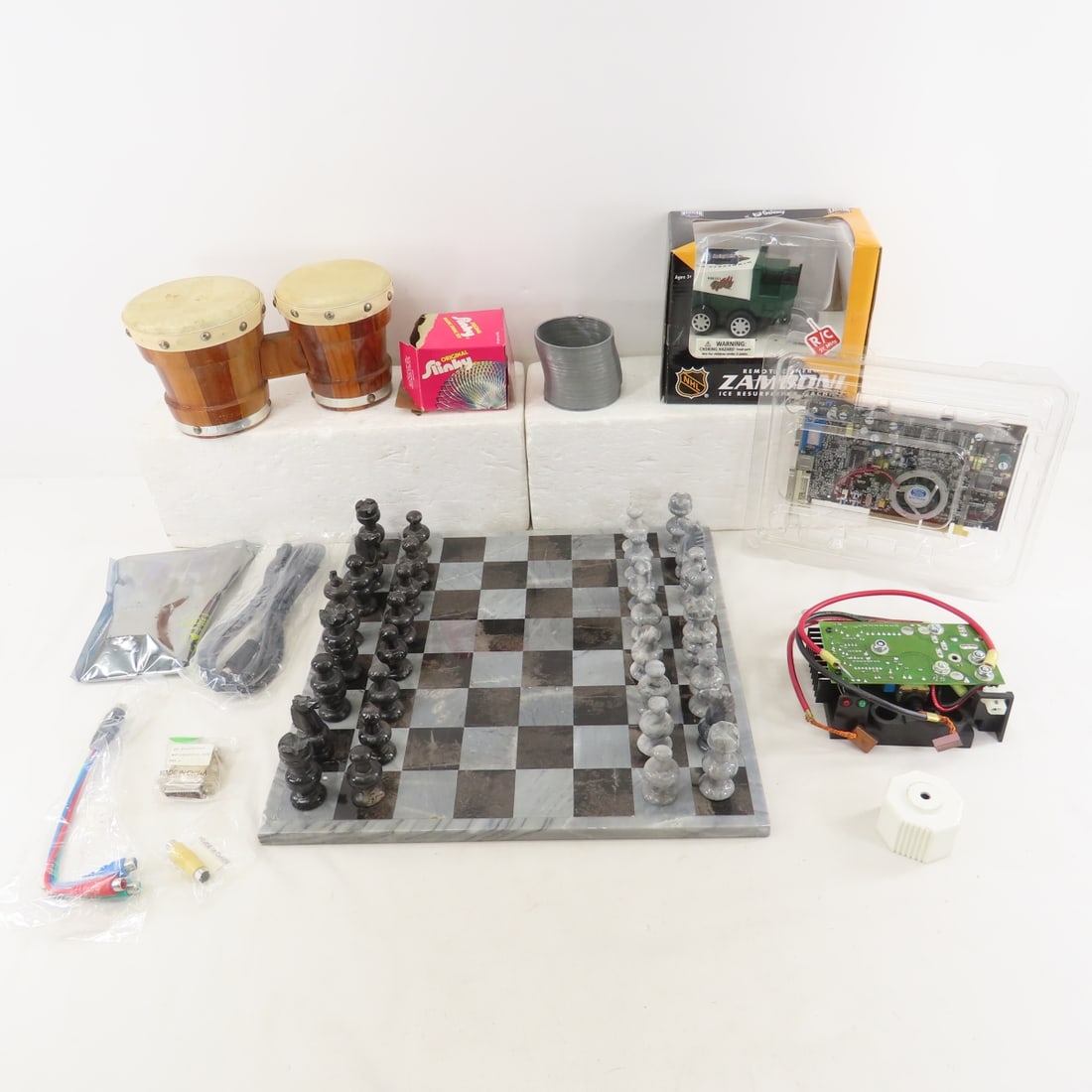 Marble Chess Set, Radeon Graphics Card & more: Marble Chess Set, Radeon Graphics Card & more - Heatsink, ATI Radeon 9600 XT graphics card, 128MB DDR Memory, Minnesota Wild Zamboni, mini Bongo Drums, Slinky, Marble Chess board & 32 Pieces. Largest