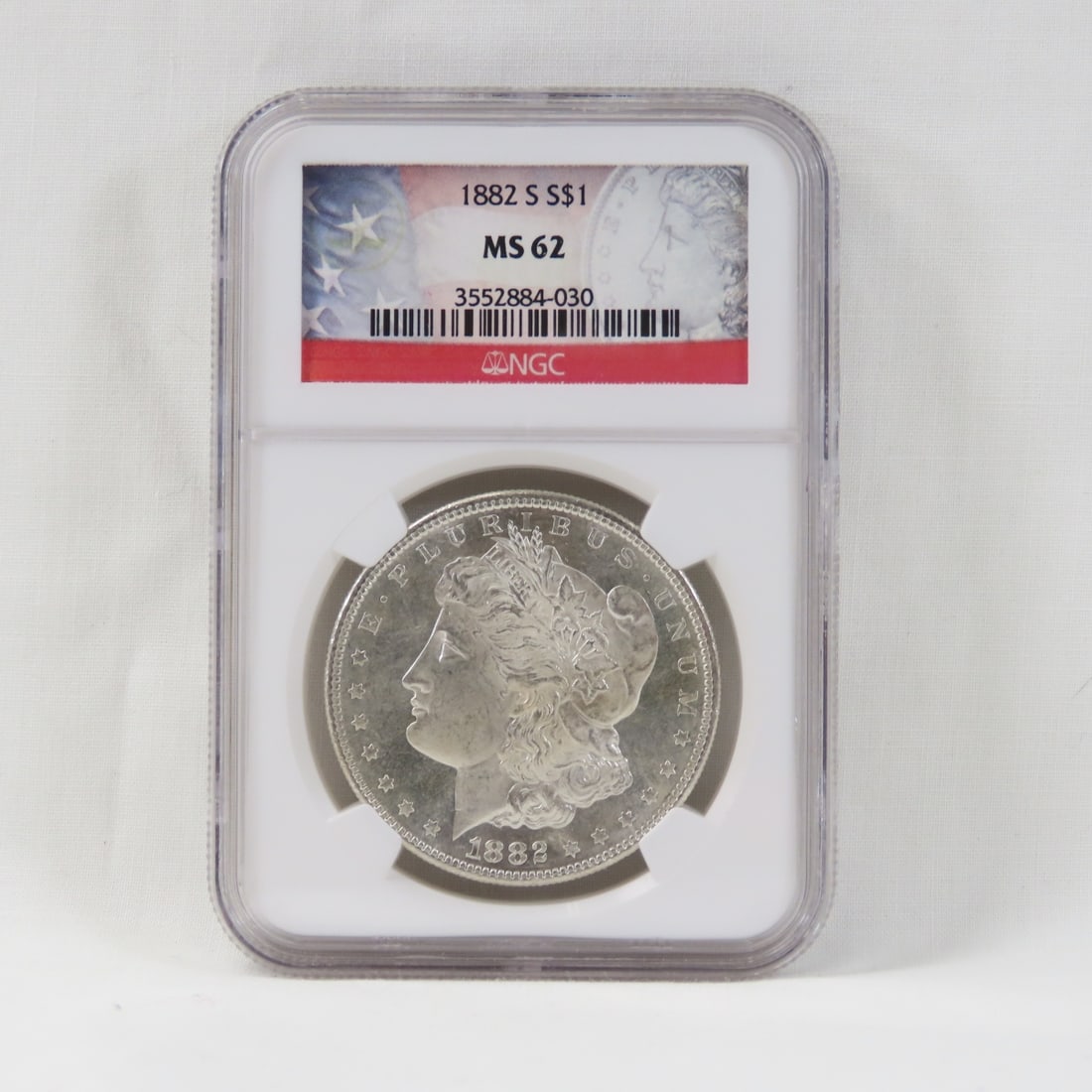 1882 S Morgan Silver Dollar NGC MS62: 1882 S Morgan Silver Dollar NGC MS62 - Lot Size 3x2x1" 1 lb Photos are part of description, Live Auctioneers only displays the 1st 20 photos per lot. Please ask questions and read terms & conditions b