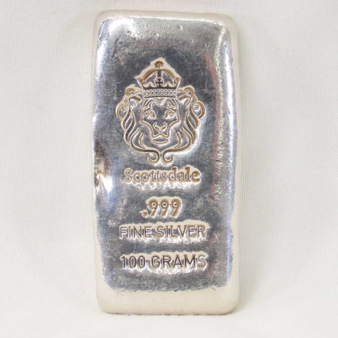 100 gram .999 Silver Scottsdale Silver Loaf Bar: 100 gram .999 Silver Scottsdale Silver Loaf Bar - Lot Size 4x3x2" 1lb Photos are part of description, Live Auctioneers only displays the 1st 20 photos per lot. Please ask questions and read terms & co
