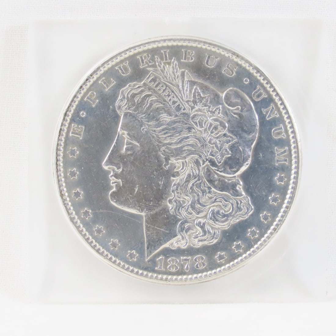 1878 CC Morgan Silver Dollar: 1878 CC Morgan Silver Dollar - Lot Size 3x2x1" 1lb Photos are part of description, Live Auctioneers only displays the 1st 20 photos per lot. Please ask questions and read terms & conditions before bid