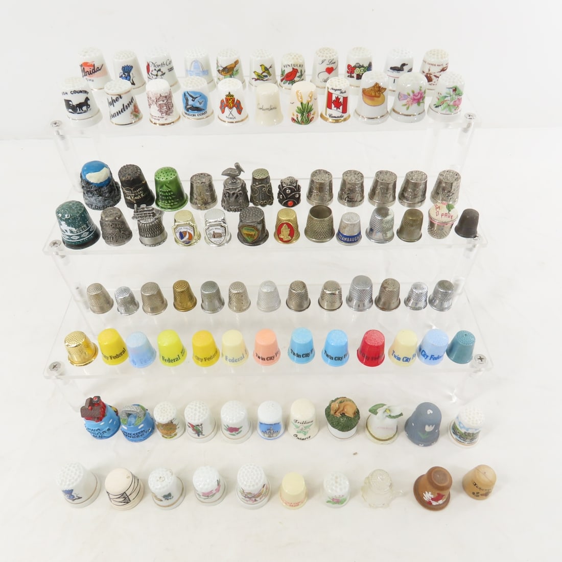 Ceramic, Metal, Plastic & Other Thimbles: Ceramic, Metal, Plastic & Other Thimbles - travel, advertising and more. Lot size 9 x 7 x 5", 1.10 lbs Photos are part of description, Live Auctioneers only displays the 1st 20 photos per lot. Please