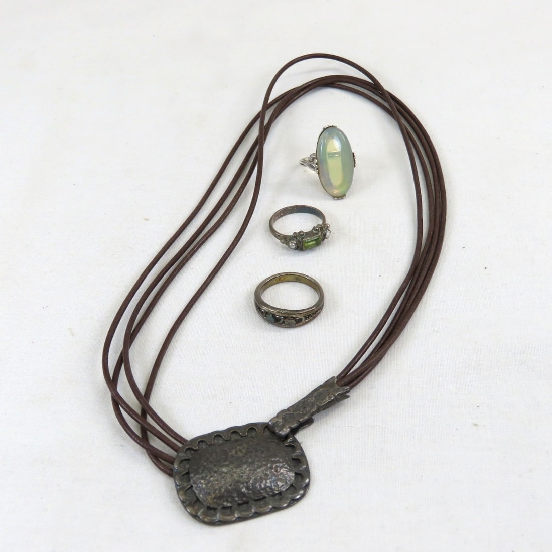 Sterling Silpada Necklace, Uncas Ring & 2 Rings: Sterling Silpada Necklace, Uncas Ring & 2 Rings - Silpada hammered 925 silver necklace on card, Uncas ring with opal like stone size 7 1/2, floral band ring 925 size 8, peridot & pearl 925 ring size 6