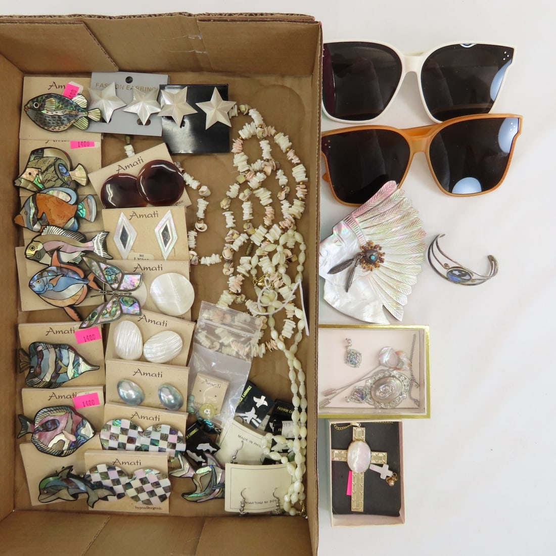 Amati Shell Brooches and Earrings & More: Amati Shell Brooches and Earrings & More - TAXCo UNS abalone & sterling butterfly brooch, shell carved into Indian chief shape with earring,2 pair plastic sunglasses, and other shell jewelry. Lot size