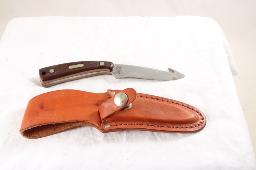 Schrade #158OT Old Timer Gut Hook F/B Knife: Schrade #158OT Old Timer Gut Hook F/B Knife - in Sheath. Lot Size 8 1/2" x 3" x 2". 6 Oz. Photos are part of description (Live Auctioneers only shows up to 20). Please ask questions and read terms & c