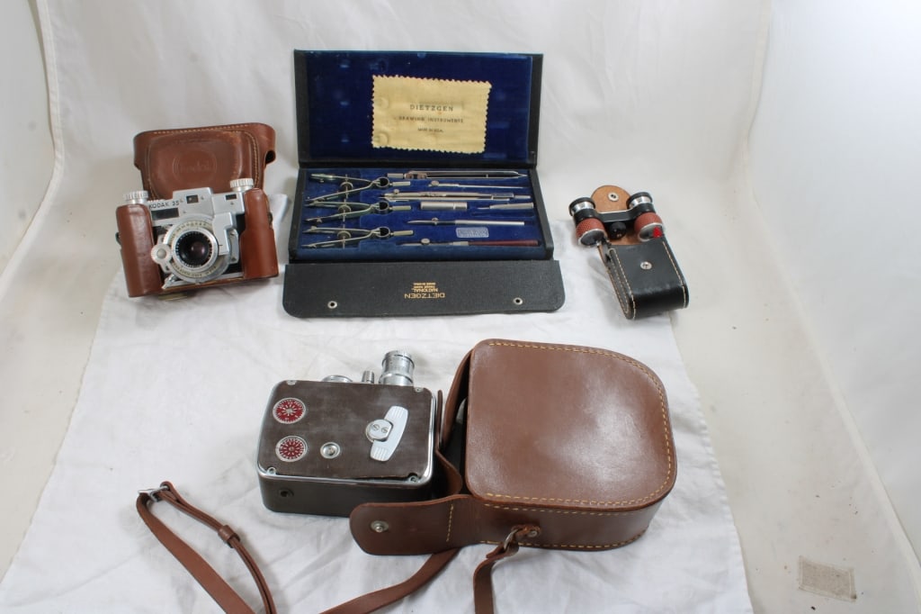 35mm Camera, B&H Movie Camera, Drafting Set and: 35mm Camera, B&H Movie Camera, Drafting Set and - BinoLux Opera Glasses in Case. Kodak 35mm Camera in Case, Bell & Howell 8mm Movie Camera in Case and Dietzen Drafting Set in Case (missing one