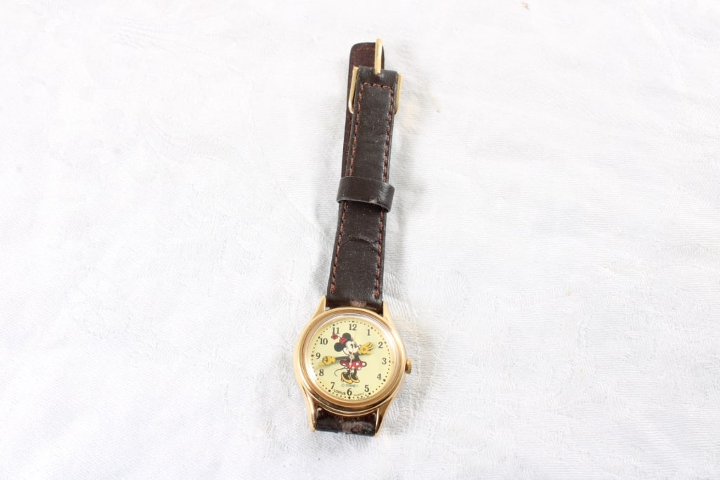 Lorus Disney Minnie Mouse Watch Works: Lorus Disney Minnie Mouse Watch Works - with Minnie Mouse Hands with new battery and working. Lot Size 4" x 4" x 4". 6 oz. Photos are part of description (Live Auctioneers only shows up to 20).