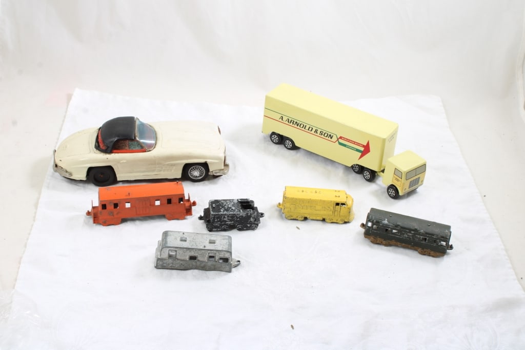 Ralstoy Truck, Tootsietoy Train Cars, Mercedes: Ralstoy Truck, Tootsietoy Train Cars, Mercedes - Ralstoy Semi Truck World Wide Moving & Storage, NK Toys Mercedes Benz, Tootsietoy 4 Metal Train Cars. 2 Lbs., Lot Size 8" x 8" x 8". Photos are part of