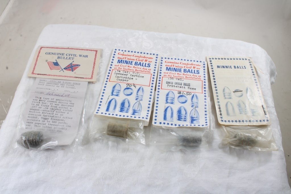 4 Confederate Civil War Relics - Minnie Balls: 4 Confederate Civil War Relics - Minnie Balls - Carbine Spencer Cartridge. 5 Oz. Lot Size 6" x 4" x 2". Photos are part of description (Live Auctioneers only shows up to 20). Please ask questions