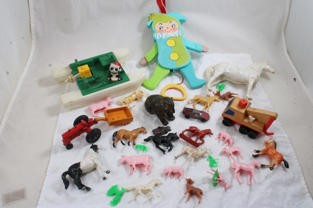 Vintage Toy Lot: Vintage Toy Lot - Grizzly Bear Paperweight Pot Metal, Horses, Tractor & Wagon, Fisher Price Jumping Jack, 1971 Mattel Wood Tow Truck & More. 3 Lbs. Lot Size 15" x 10" x 3". Photos are part of descript