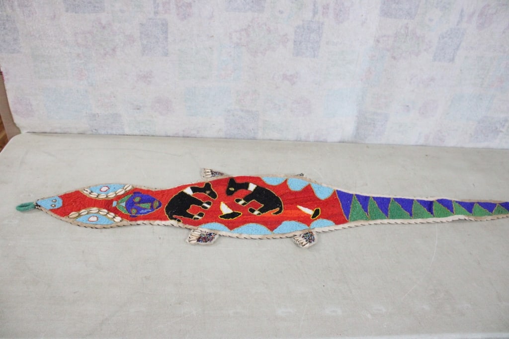 Tribal Yoruba Beaded Lizard Belt Sash: Tribal Yoruba Beaded Lizard Belt Sash - 57" L x 9" W can be folded for shipping. 2 Lbs. Lot Size 10" x 10" x 6". Photos are part of description (Live Auctioneers only shows up to 20). Please ask