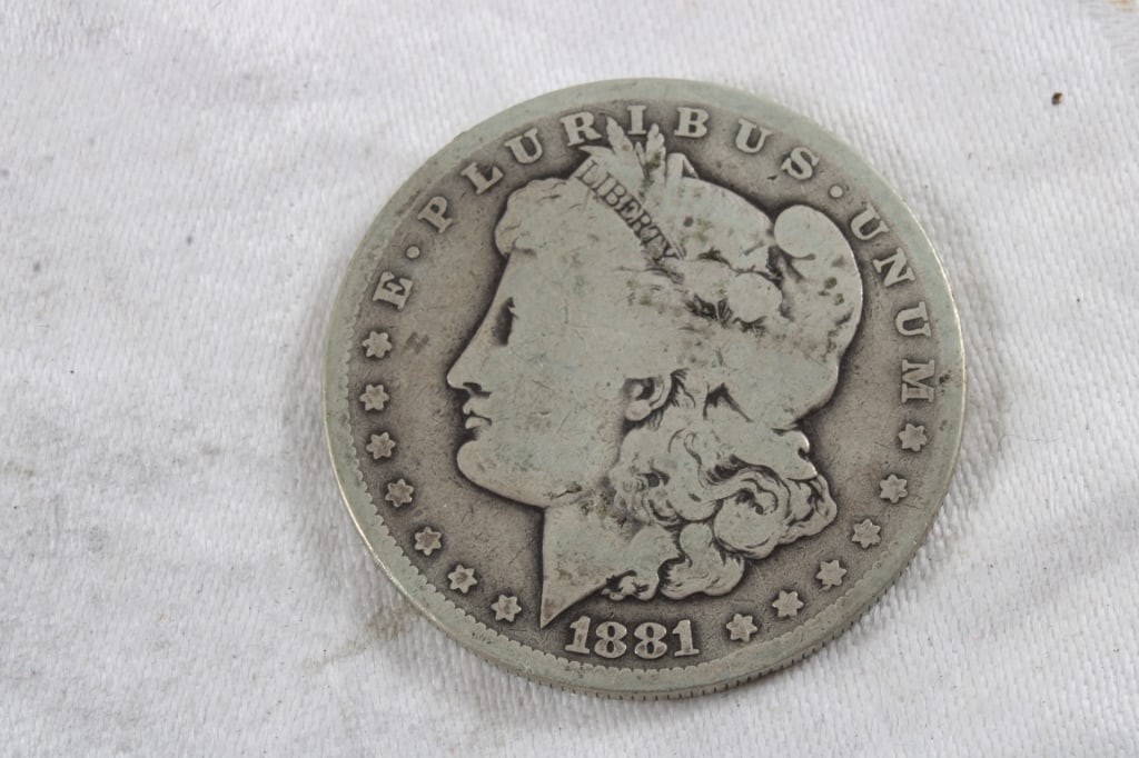 1881 O Morgan Silver Dollar: 1881 O Morgan Silver Dollar - 3 Oz. 1.5" Diameter. Photos are part of description (Live Auctioneers only shows up to 20). Please ask questions and read terms & conditions before bidding. 